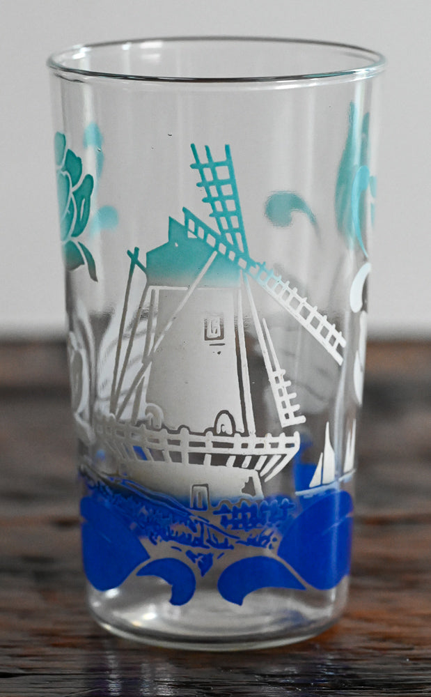 light blue, white and blue floral and windmill pattern glass
