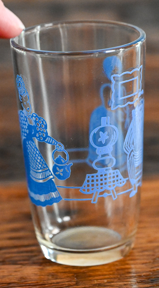 Kraft lamp on table in blue pattern glass