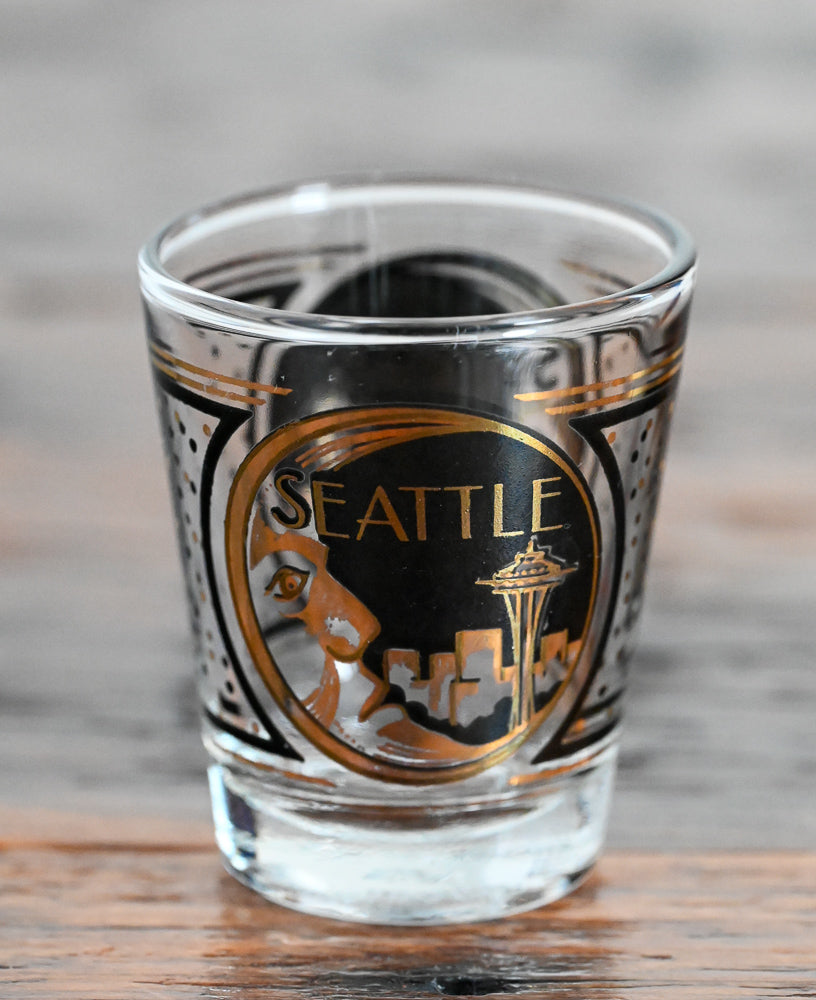 black and gold print Seattle Souvenir shot glass