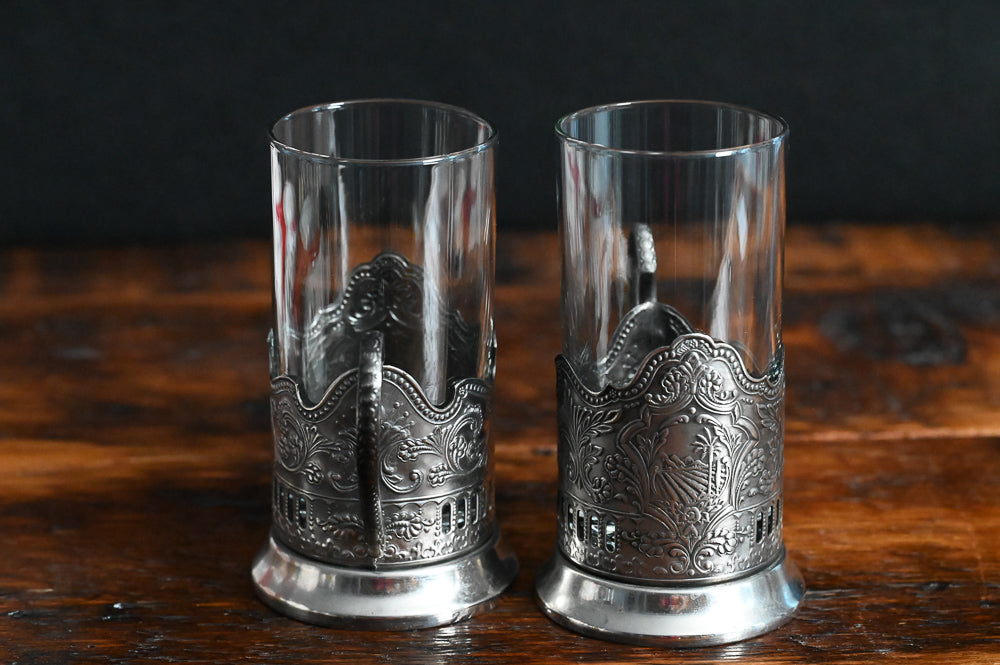 silver filigreed holder with handle and clear glass Russian tea glass