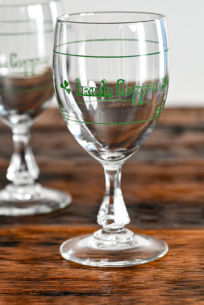 clear goblet with green "Irish Coffee" and clovers on it in green