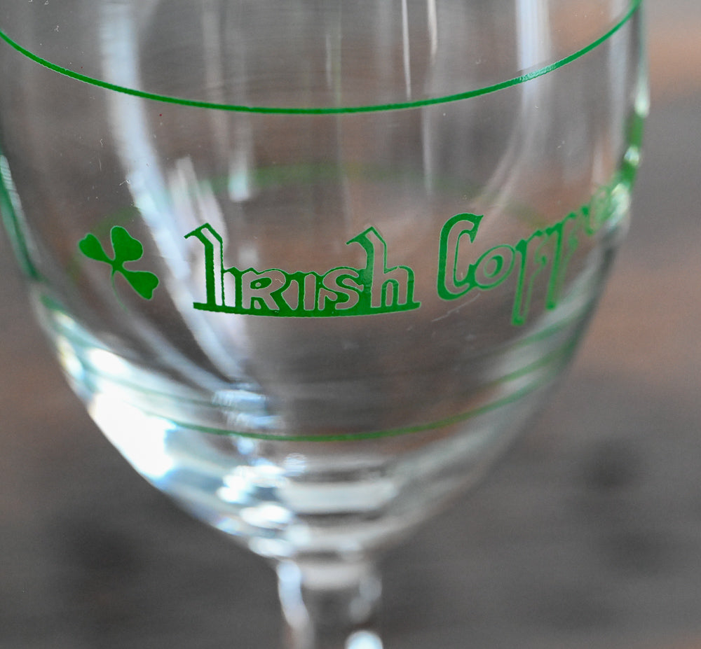 clear goblet with green "Irish Coffee" and clovers on it in green