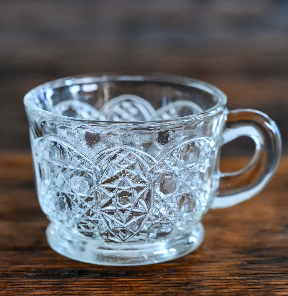 cut glass tea cup with handle