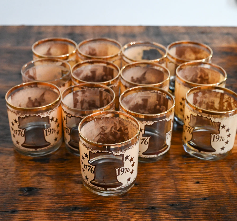 tan and brown rocks glasses with liberty bell and 1776-1976 with brown stars