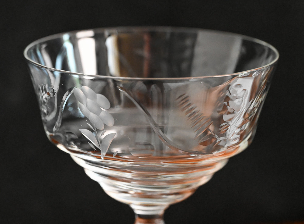 floral etched coupe on wood table