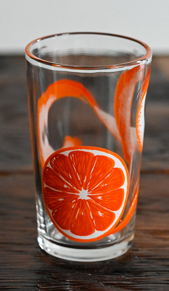 orange peel all around clear juice glass