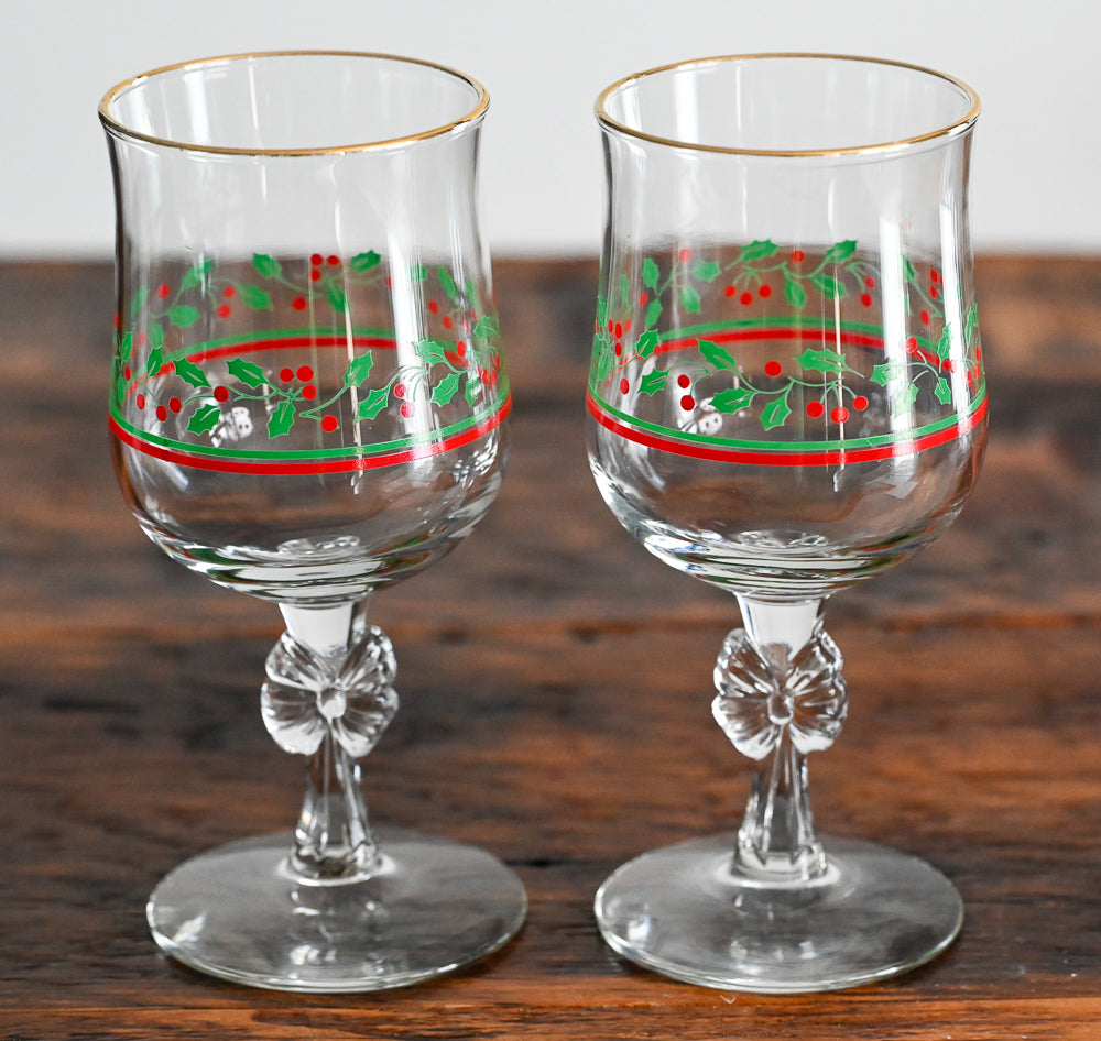 Libbey goblet with bow stem, green and red holly print, gold rim