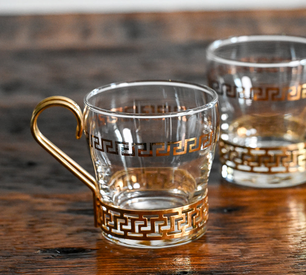 Libbey clear glass with greek gold scroll, gold metal handle