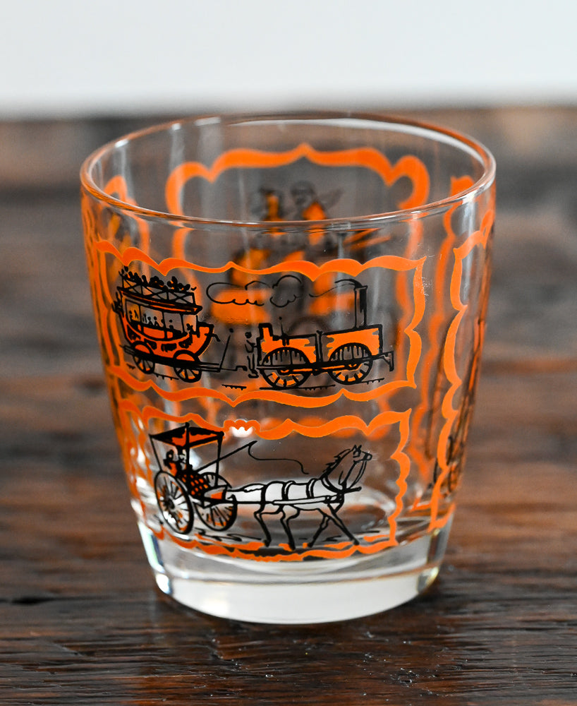 orange and black transportation print lowball glass