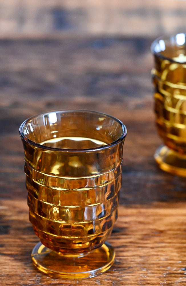 Indiana Glass amber footed tumbler