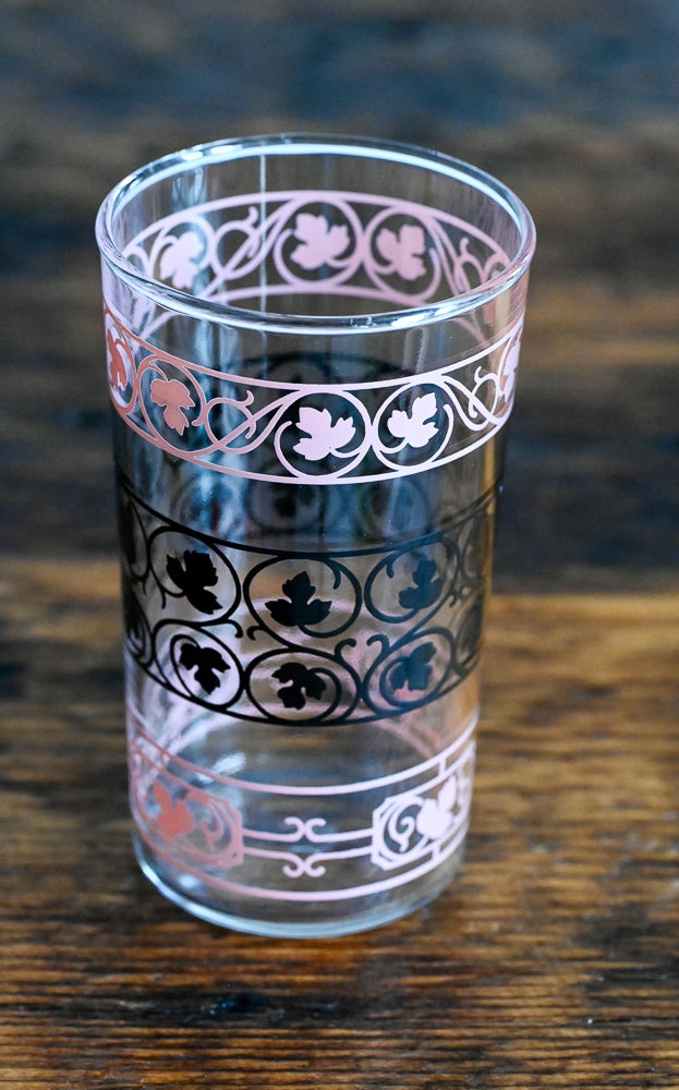 pink and black print tumbler glass