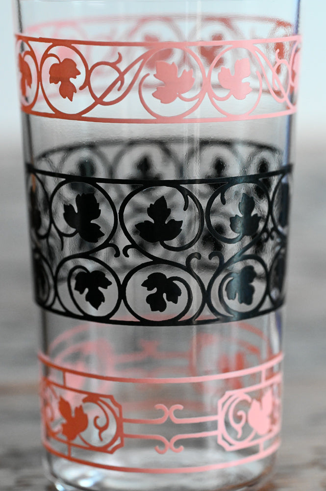 pink and black print tumbler glass