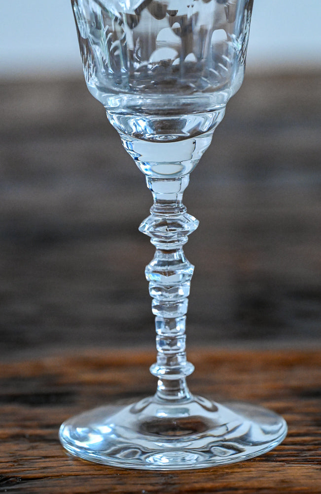 floral etched glass on wood table