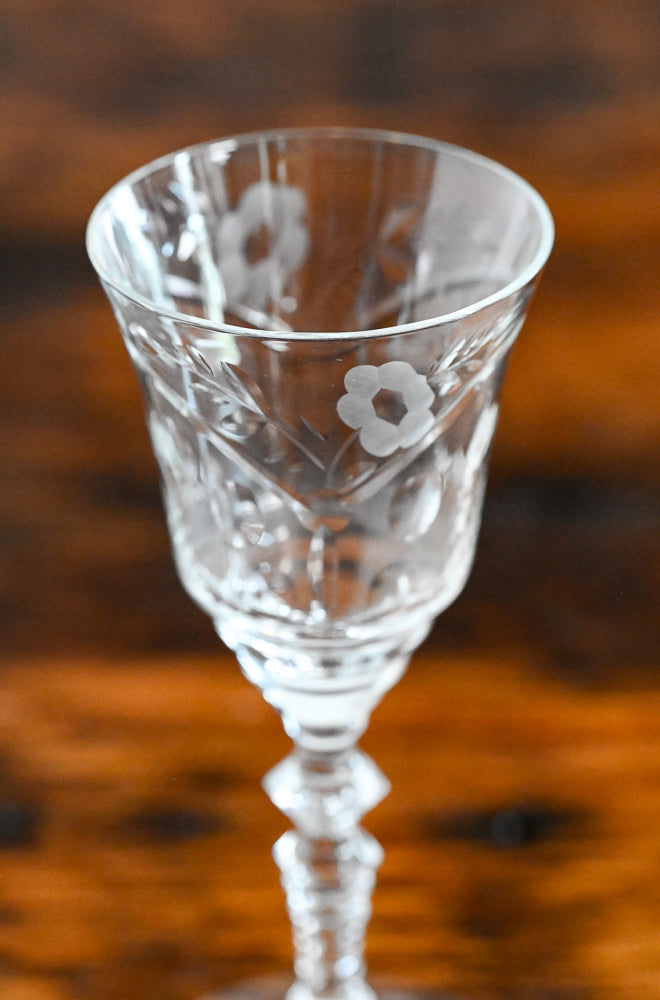 floral etched glass on wood table