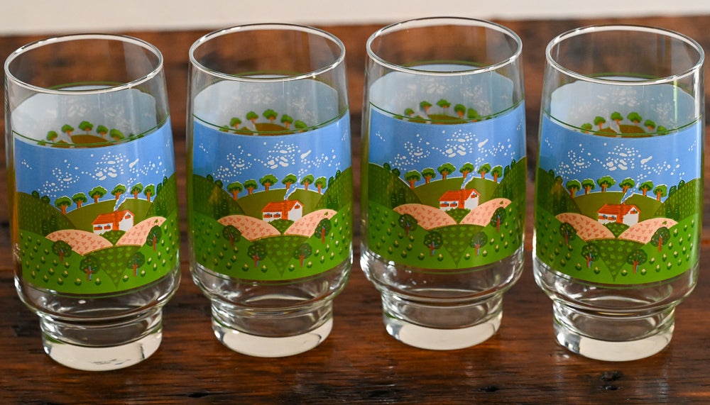 Sango Farm scene print glass on wooden table