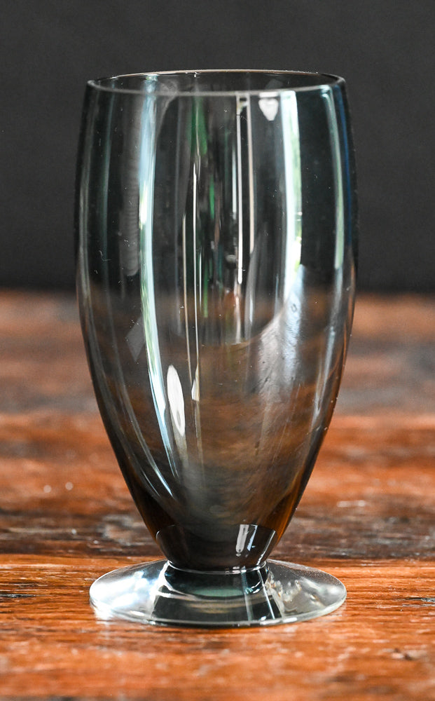 gray glass footed tumbler