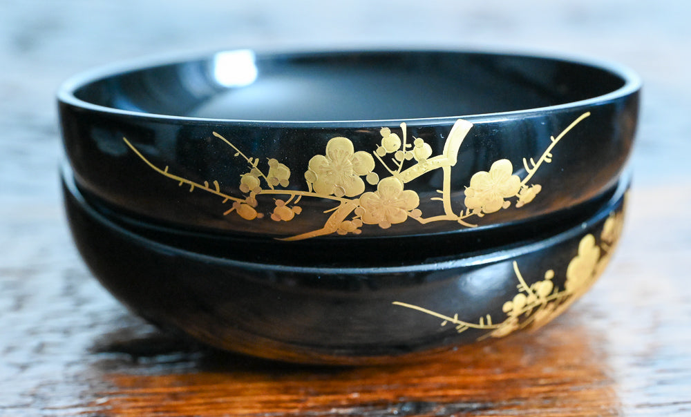 black bowls with gold flowers design