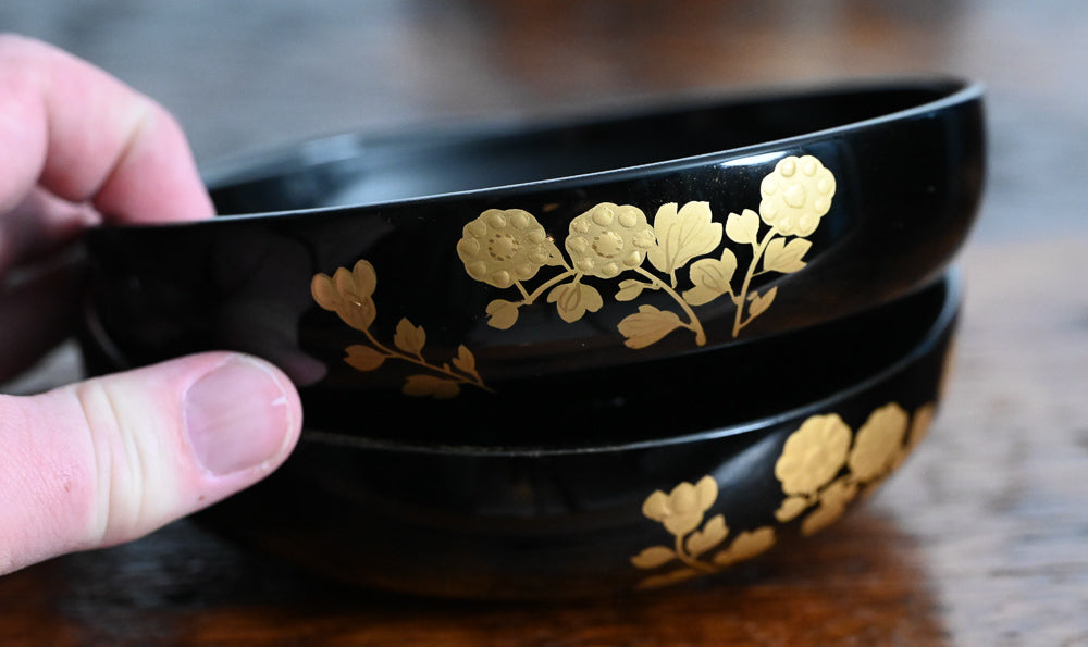black bowls with gold flowers design