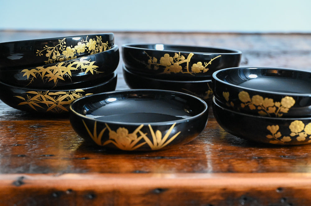 black bowls with gold flowers design