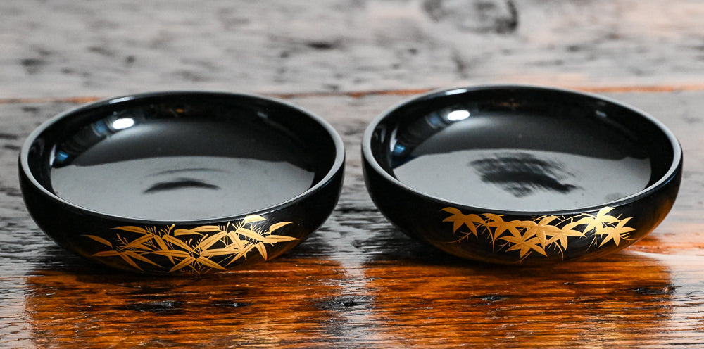 black bowls with gold flowers design