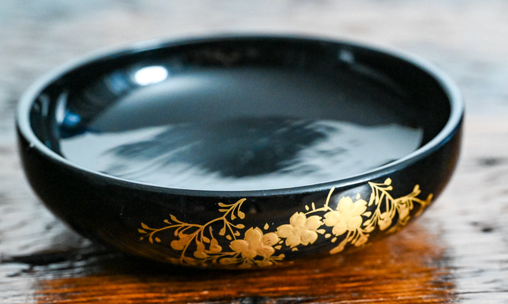 black bowls with gold flowers design