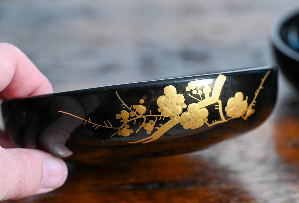 black bowls with gold flowers design