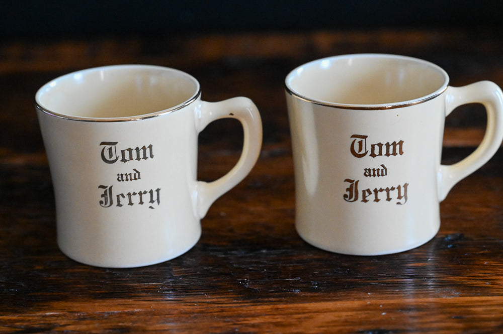 cream china Homer Laughlin Tom and Jerry Mugs, gold words and rim