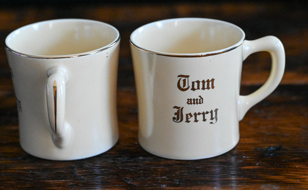 cream china Homer Laughlin Tom and Jerry Mugs, gold words and rim