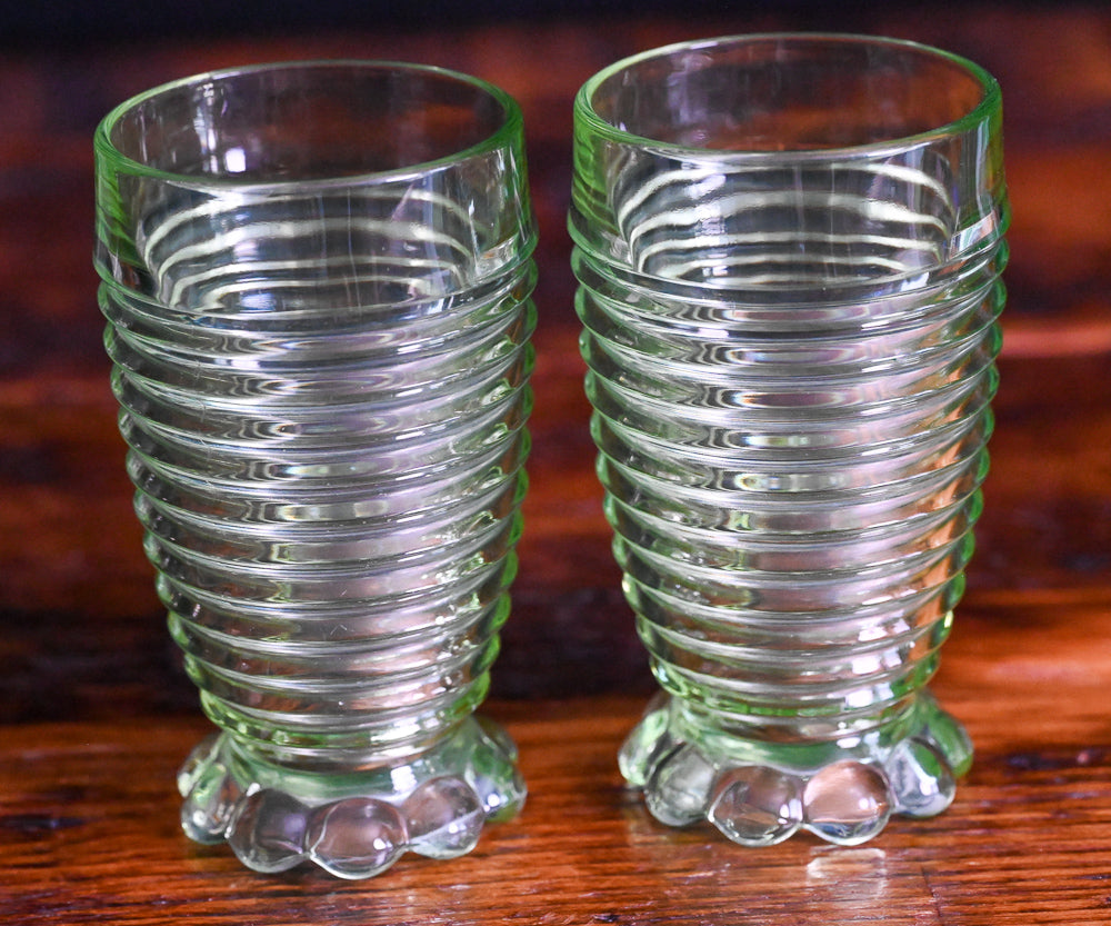 light green Uranium Anchor Hocking Manhattan footed tumblers
