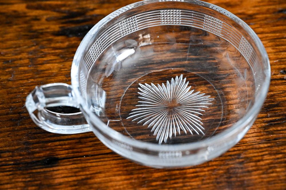 etched lines on sides of shallow bowl with handle