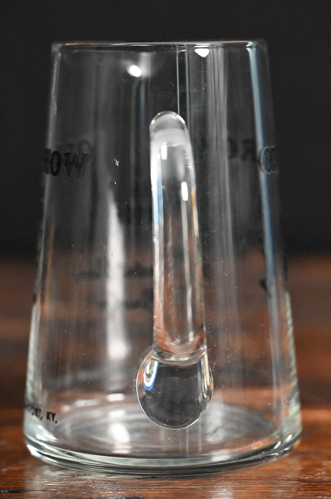 glass Old Crow pitcher with black writing and logo