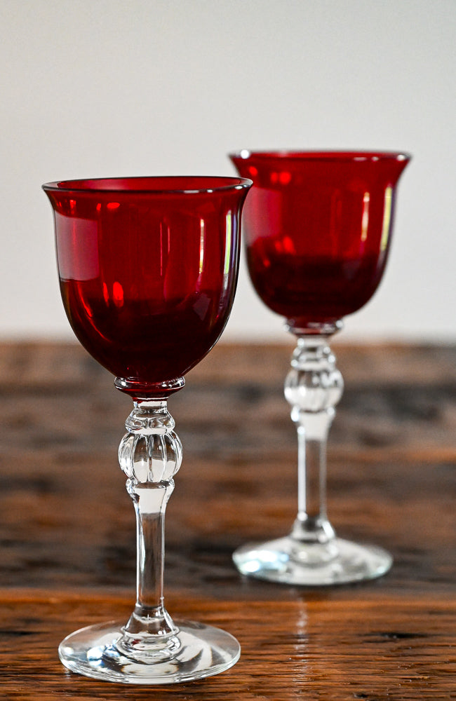red glasses with clear stems