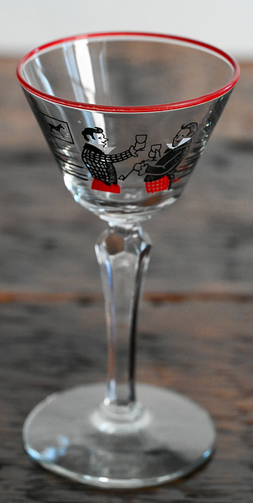 black and red scene of men drinking, red rim cocktail coupe Libbey