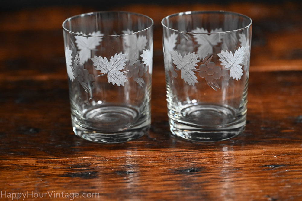 etched leaves and grapes clear rocks glasses