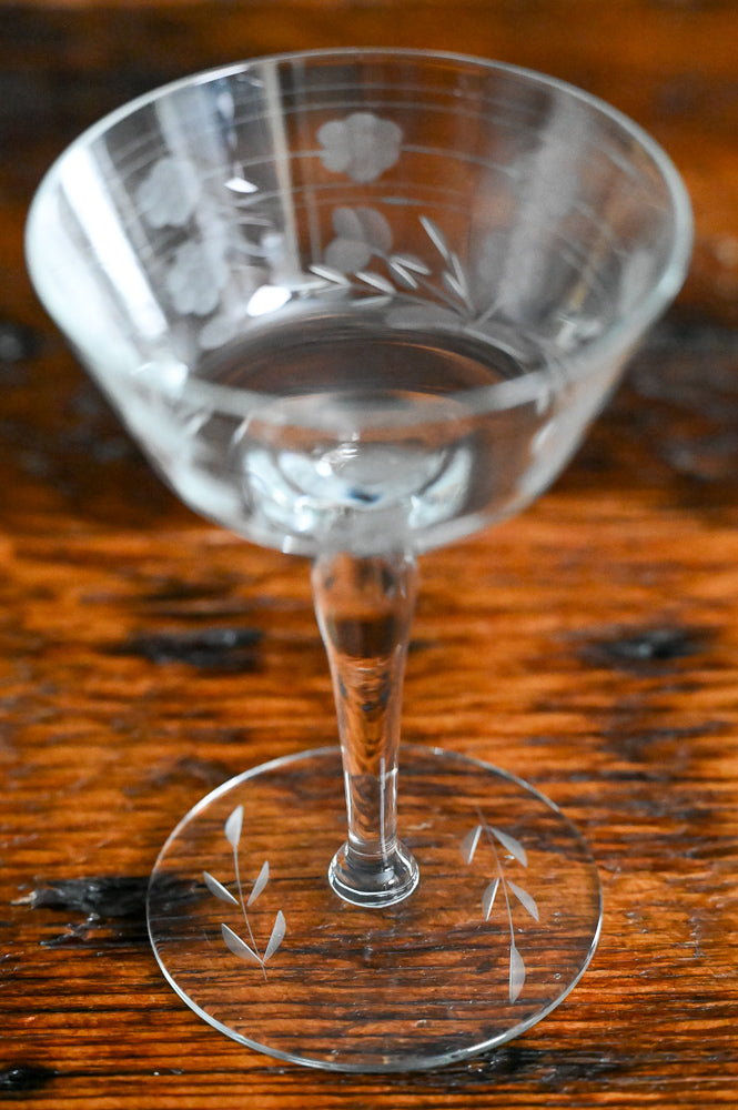floral and line etched clear cocktail coupes