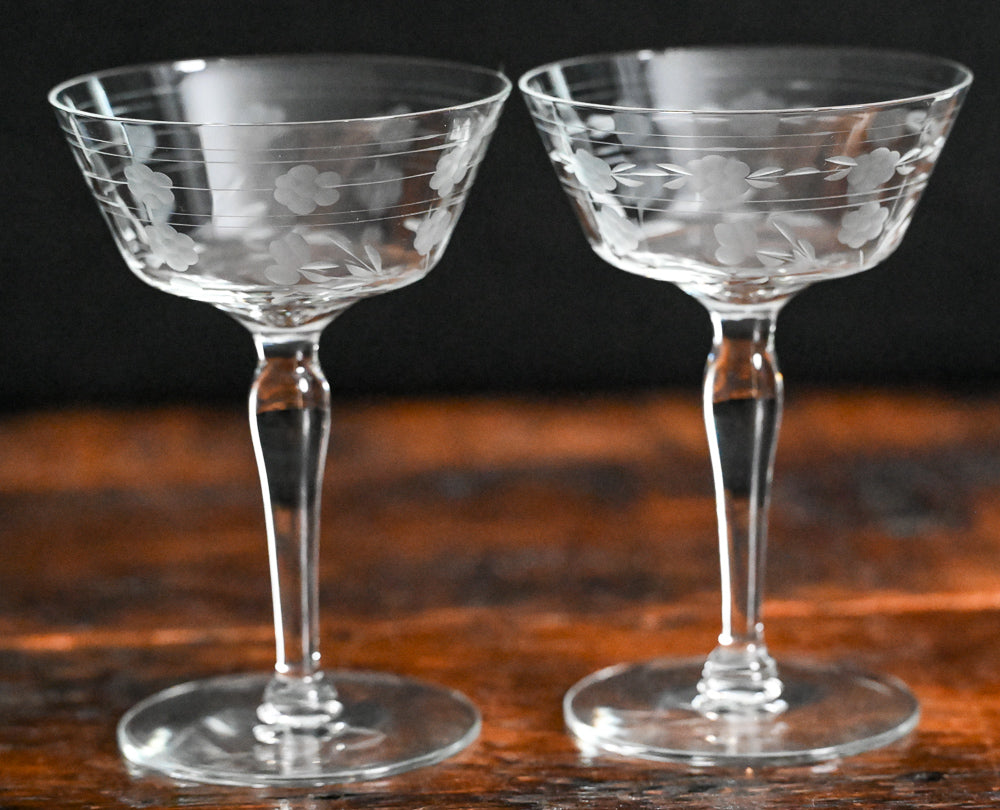 floral and line etched clear cocktail coupes