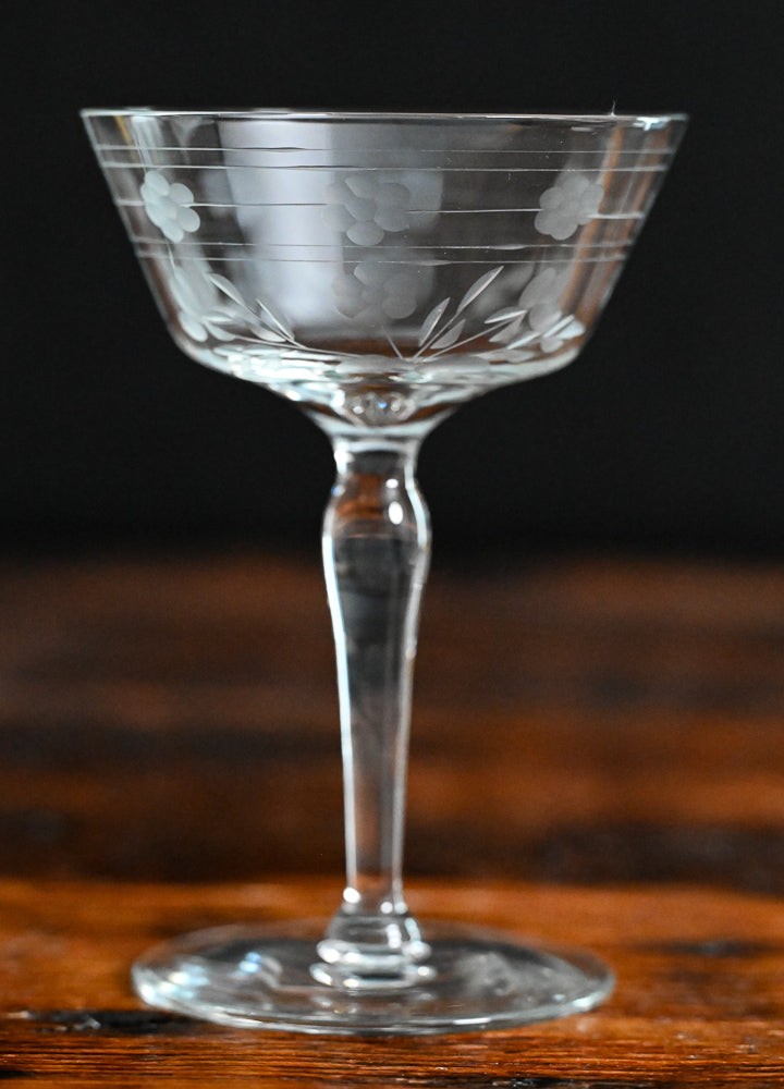 floral and line etched clear cocktail coupes