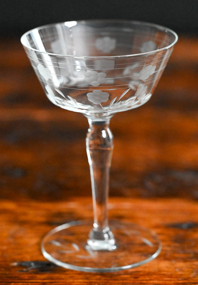 floral and line etched clear cocktail coupes