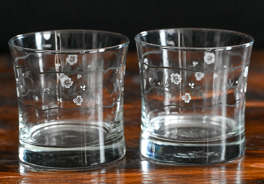 white and gray floral rocks glass