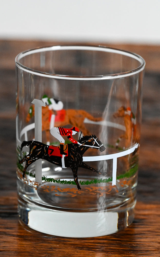 horses and jockeys rocks glass