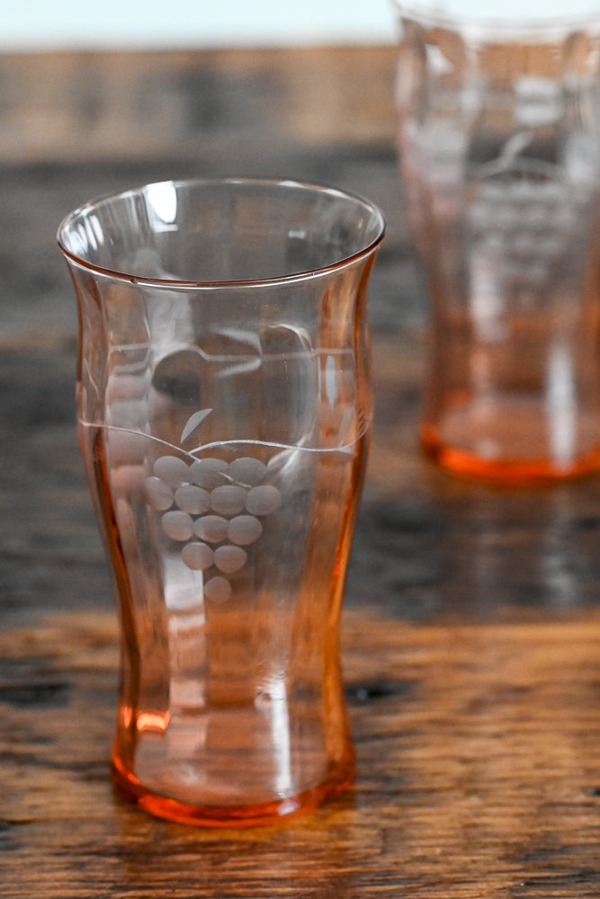 pink glass etched with grape bunches