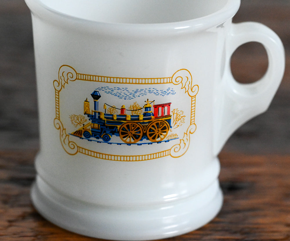 milk glass mug with locomotive logo from Avon