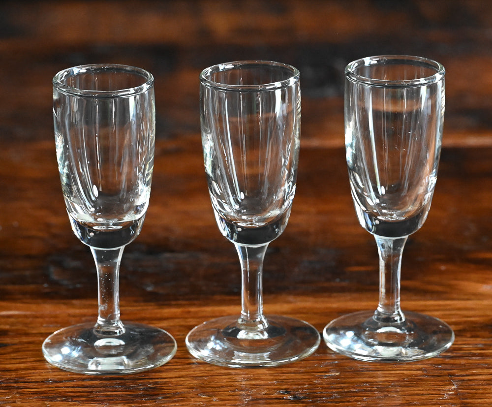 3 clear cordial glasses