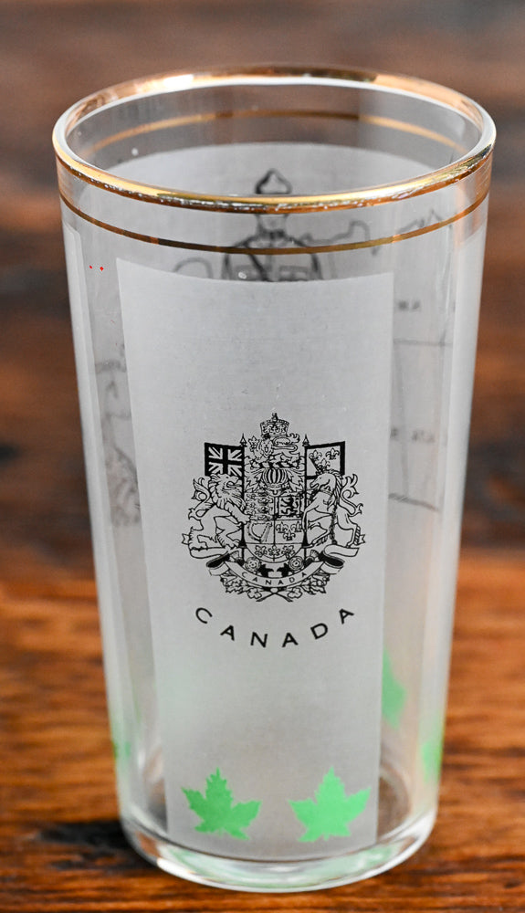 frosted tumbler with Candian Mountie and Canada Map