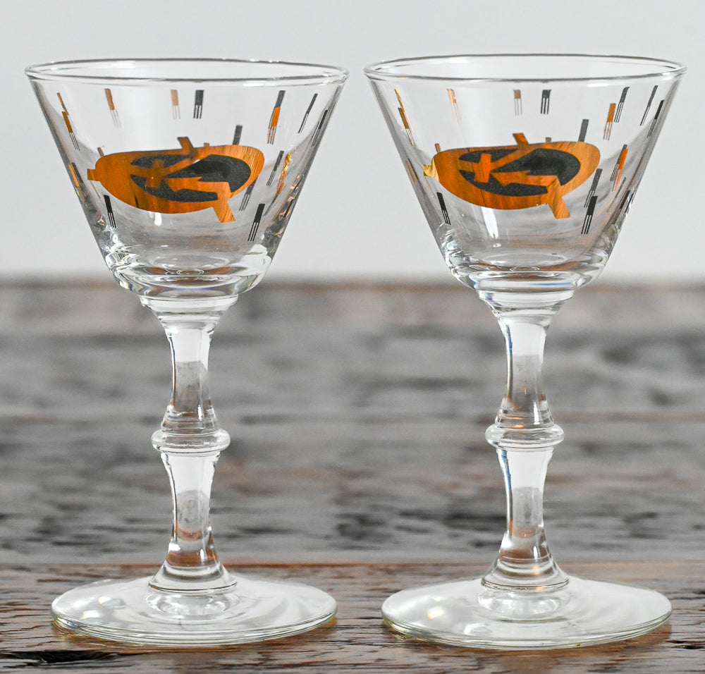 black and gold logo cordial glasses
