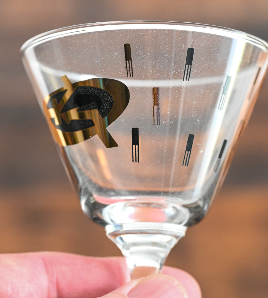 black and gold logo cordial glasses