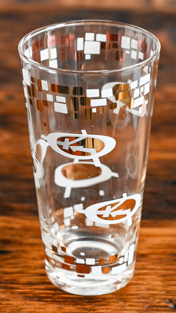 white and gold logo highball glasses