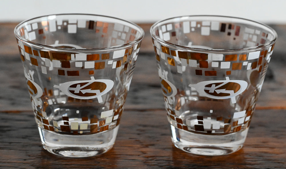 gold and white MCM logo double rocks glasses