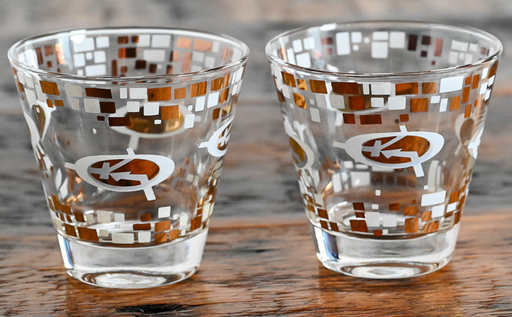 gold and white MCM logo double rocks glasses