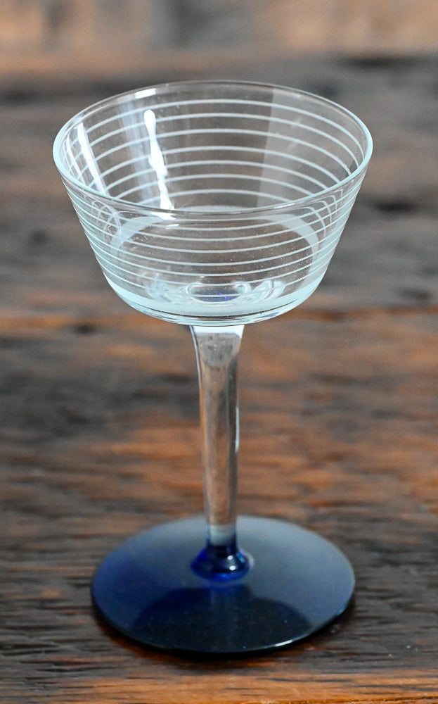lined clear coupe with blue foot